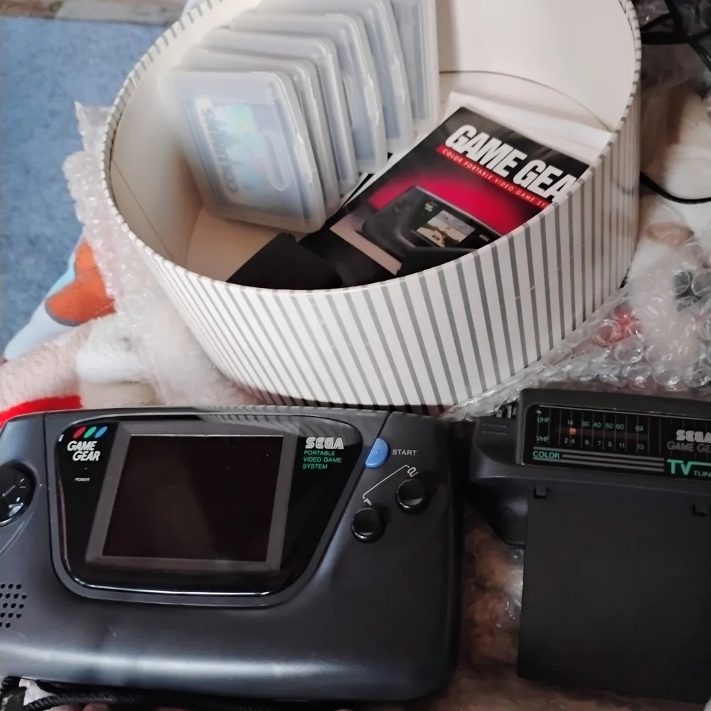 SEGA Game Gear Handheld Console No Scratches. Comes With TV Adapter And 6 Games